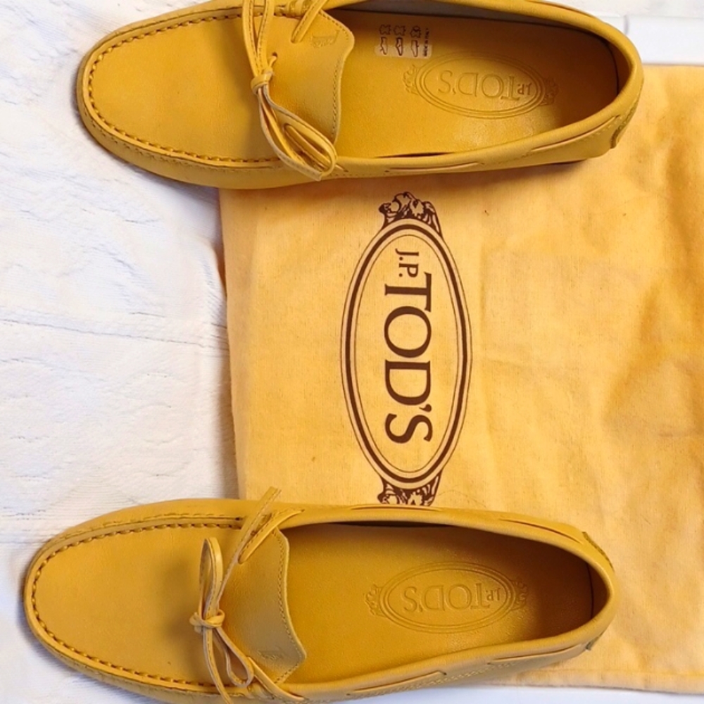 Tod's Gommino yellow loafer.